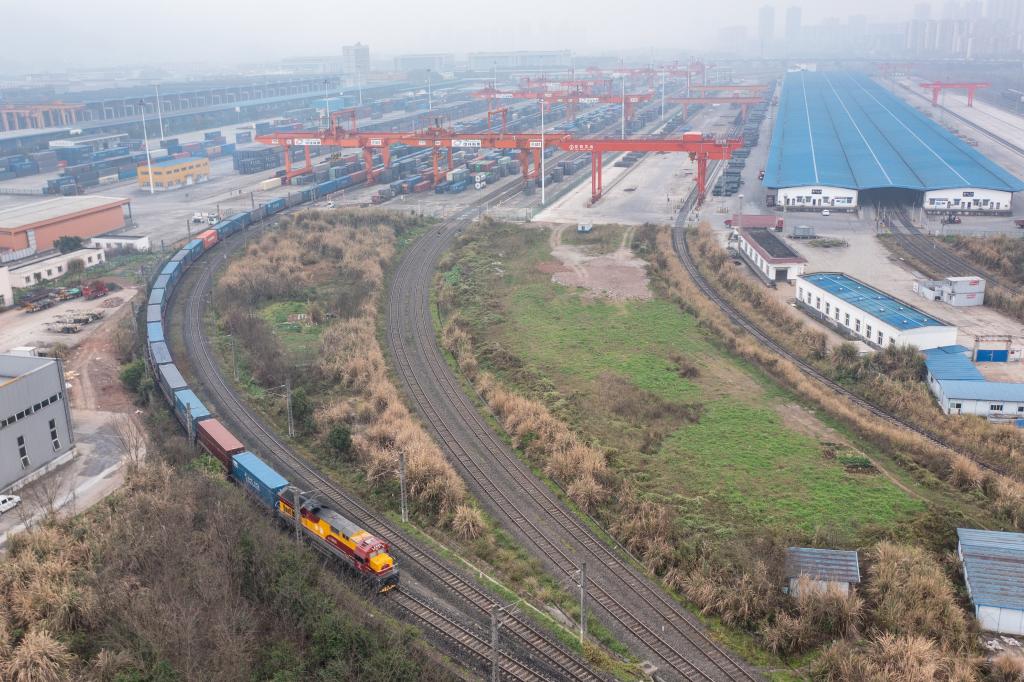 On March 7th, a China Europe freight train loaded with mechanical equipment, complete vehicles, and components departed from the central station of Tuanjie Village in Chongqing (drone photo).