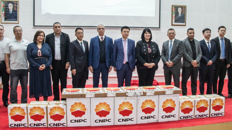 The picture shows the handover ceremony of teaching equipment at the Second University of Algiers. (Image provided by China Petroleum Africa Company)